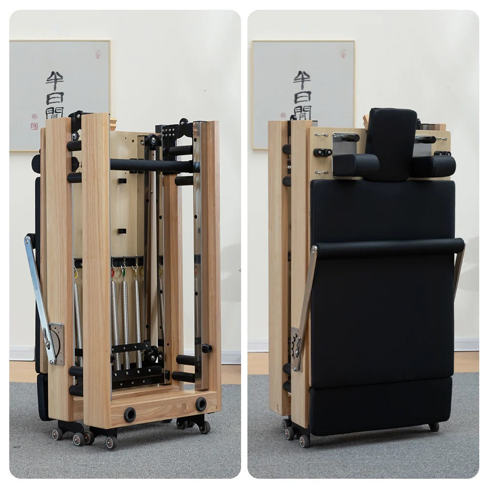 Foldable Oak Pilates Reformer folded upright for storage